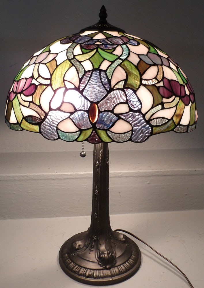 Leaded & Stained Glass Tiffany Style Lamp: Leaded & Stained Glass Tiffany Style Lamp. 23" H "ALL DESCRIPTIONS AND ANY CONDITION STATEMENT GIVEN BY LANGSTON AUCTION GALLERY ARE STRICTLY OPINIONS AND LANGSTON'S SHALL HAVE NO RESPONSIBILITY FOR E