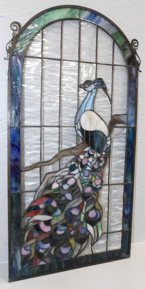 Leaded Stain Glass Peacock Sun Catcher: Leaded Stain Glass Peacock Sun Catcher . 13" x 24 1/4" "ALL DESCRIPTIONS AND ANY CONDITION STATEMENT GIVEN BY LANGSTON AUCTION GALLERY ARE STRICTLY OPINIONS AND LANGSTON'S SHALL HAVE NO RESPONSIBILITY