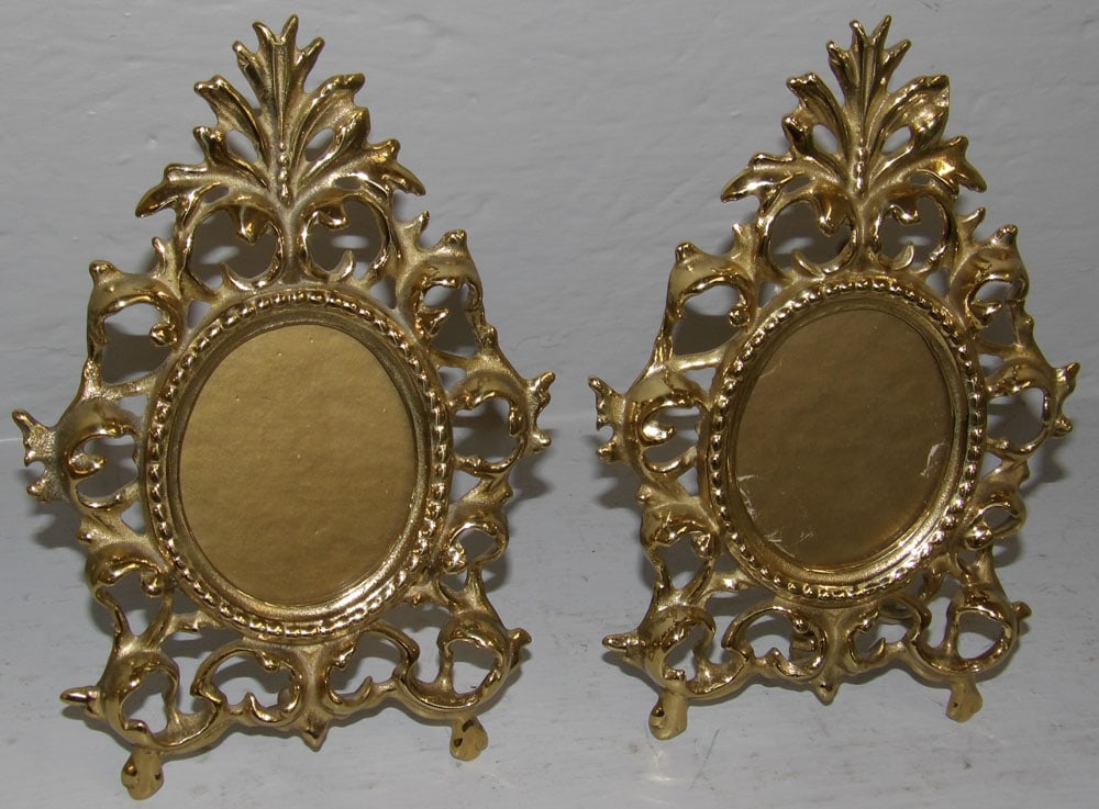 Pair of Ornate Open Work Foliage Brass Frames by VA Metalcrafters: Pair of Ornate Open Work Foliage Brass Frames by VA Metalcrafters. 5 1/2" x 7" "ALL DESCRIPTIONS AND ANY CONDITION STATEMENT GIVEN BY LANGSTON AUCTION GALLERY ARE STRICTLY OPINIONS AND LANGSTON'S SHAL