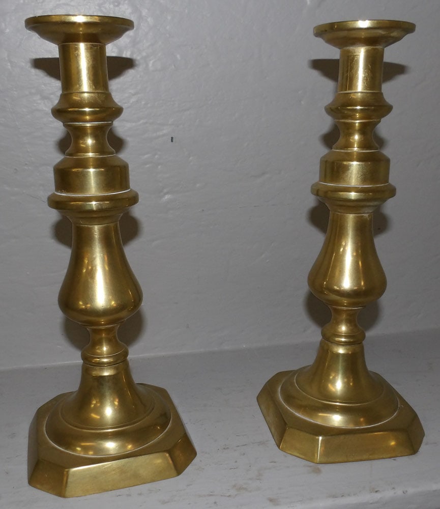 Pair of Antique Brass Candlesticks: Pair of Antique Brass Candlesticks . 11 1/4" H "ALL DESCRIPTIONS AND ANY CONDITION STATEMENT GIVEN BY LANGSTON AUCTION GALLERY ARE STRICTLY OPINIONS AND LANGSTON'S SHALL HAVE NO RESPONSIBILITY FOR ERR