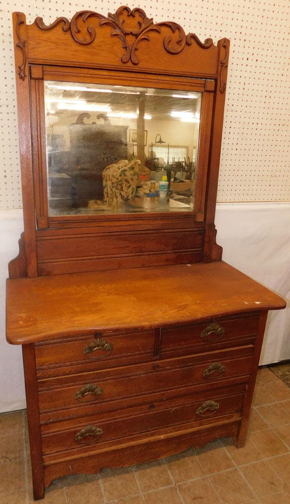 Antique Oak Dresser with Bevel Edge Mirror: Antique Oak Dresser with Bevel Edge Mirror. 42" W 20 1/2" D 74" H "ALL DESCRIPTIONS AND ANY CONDITION STATEMENT GIVEN BY LANGSTON AUCTION GALLERY ARE STRICTLY OPINIONS AND LANGSTON'S SHALL HAVE NO RES