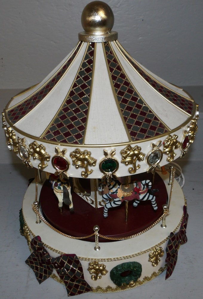 Electric Carousel: Electric Carousel. 16 3/4" H "ALL DESCRIPTIONS AND ANY CONDITION STATEMENT GIVEN BY LANGSTON AUCTION GALLERY ARE STRICTLY OPINIONS AND LANGSTON'S SHALL HAVE NO RESPONSIBILITY FOR ERRORS OR OMISSIONS. 