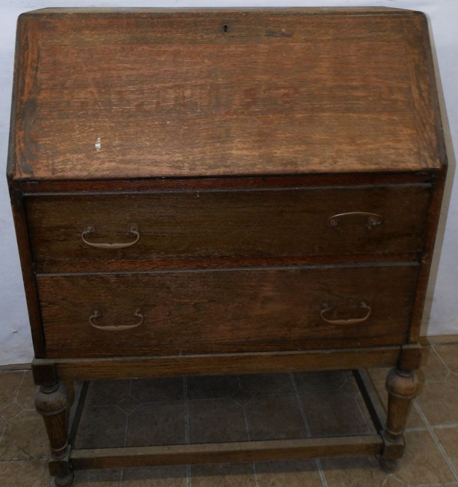 Antique Oak Slant Front Desk: Antique Oak Slant Front Desk . 30 1/4" W 15 1/2" D 39 1/4" H "ALL DESCRIPTIONS AND ANY CONDITION STATEMENT GIVEN BY LANGSTON AUCTION GALLERY ARE STRICTLY OPINIONS AND LANGSTON'S SHALL HAVE NO RESPONSI