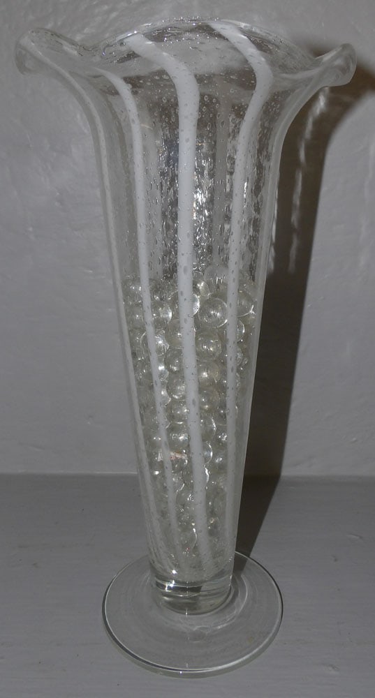 Art Glass Vase with Glass Marbles: Art Glass Vase with Glass Marbles. 12" H "ALL DESCRIPTIONS AND ANY CONDITION STATEMENT GIVEN BY LANGSTON AUCTION GALLERY ARE STRICTLY OPINIONS AND LANGSTON'S SHALL HAVE NO RESPONSIBILITY FOR ERRORS OR