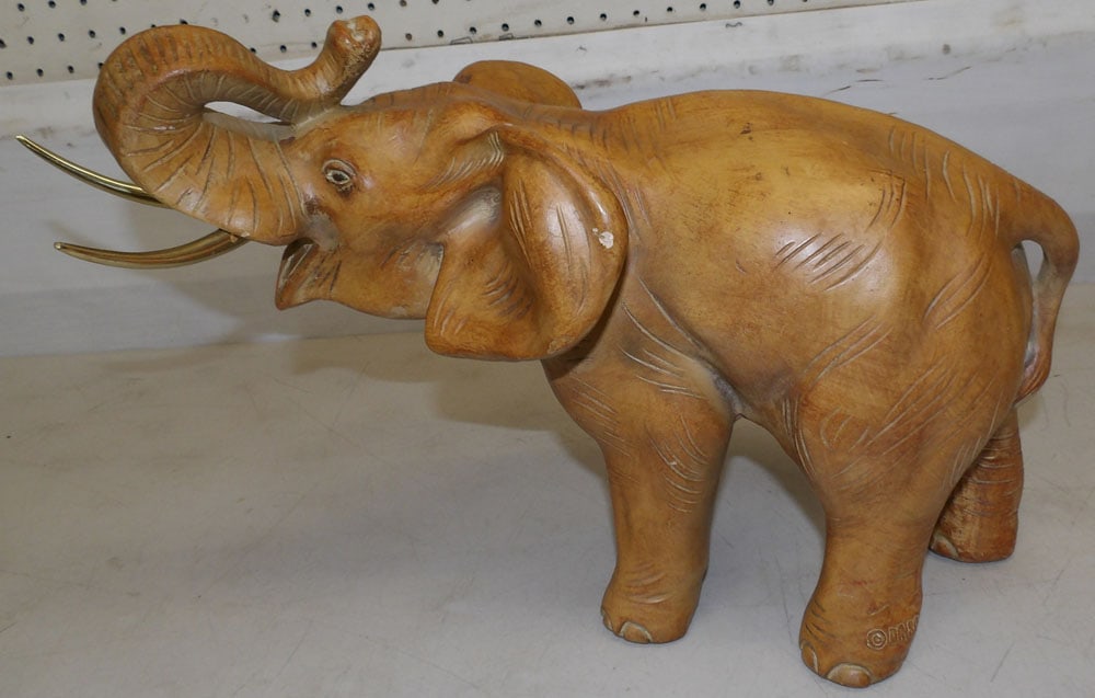 painted ceramic elephant: painted ceramic elephant. 18" L 12 1/2" H