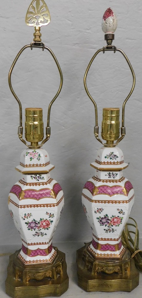 pair of Chinese porcelain urns made into lamps: pair of Chinese porcelain urns made into lamps. 21" H