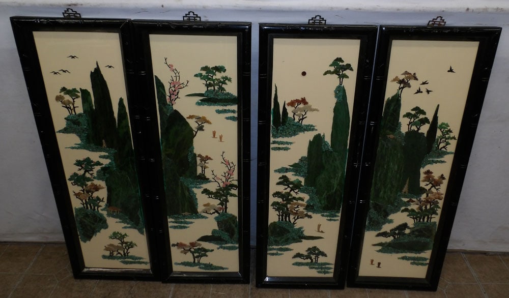 four oriental carved stone wall panels behind glass (1 of 6)