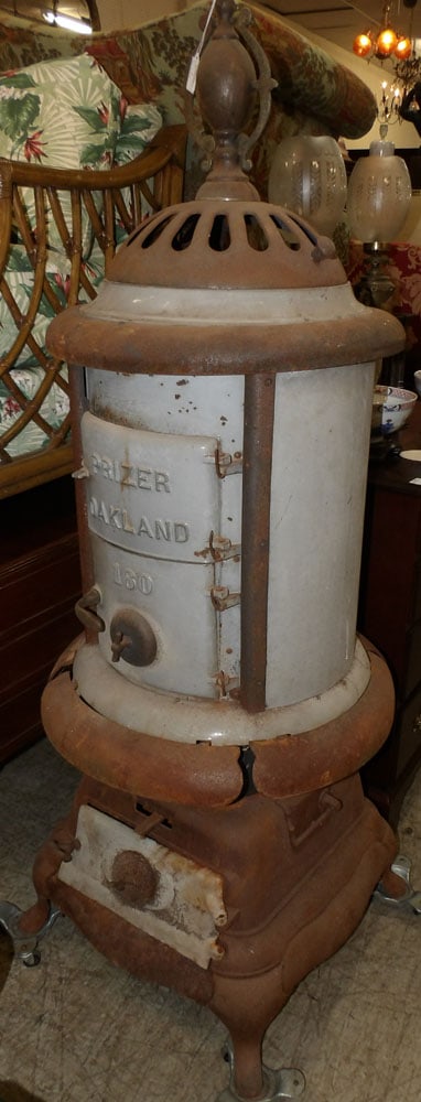 antique cast iron wood heater: antique cast iron wood heater . 64 1/2" H