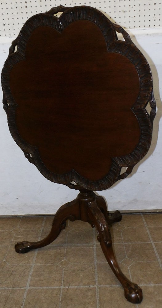 Carved Mahogany Tilt Top Table with Ball & Claw Feet: Carved Mahogany Tilt Top Table with Ball & Claw Feet. 29 1/2" Dia. 30 1/2" H