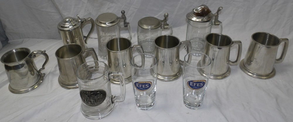 lot of pewter and glass beer mugs: lot of pewter and glass beer mugs. ALL DESCRIPTIONS AND ANY CONDITION STATEMENT GIVEN BY LANGSTON AUCTION GALLERY ARE STRICTLY OPINIONS AND LANGSTON'S SHALL HAVE NO RESPONSIBILITY FOR ERRORS OR OMISSI