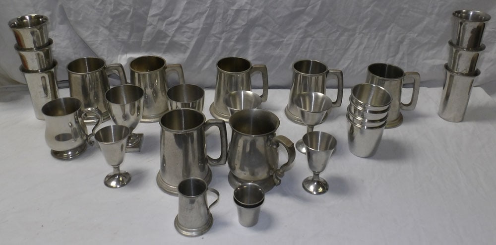 lot of pewter mugs: lot of pewter mugs. ALL DESCRIPTIONS AND ANY CONDITION STATEMENT GIVEN BY LANGSTON AUCTION GALLERY ARE STRICTLY OPINIONS AND LANGSTON'S SHALL HAVE NO RESPONSIBILITY FOR ERRORS OR OMISSIONS. THE ABSENC