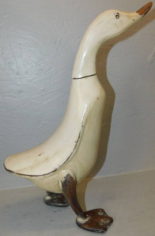 painted carved wood duck: painted carved wood duck. 16 3/4" H ALL DESCRIPTIONS AND ANY CONDITION STATEMENT GIVEN BY LANGSTON AUCTION GALLERY ARE STRICTLY OPINIONS AND LANGSTON'S SHALL HAVE NO RESPONSIBILITY FOR ERRORS OR OMISS