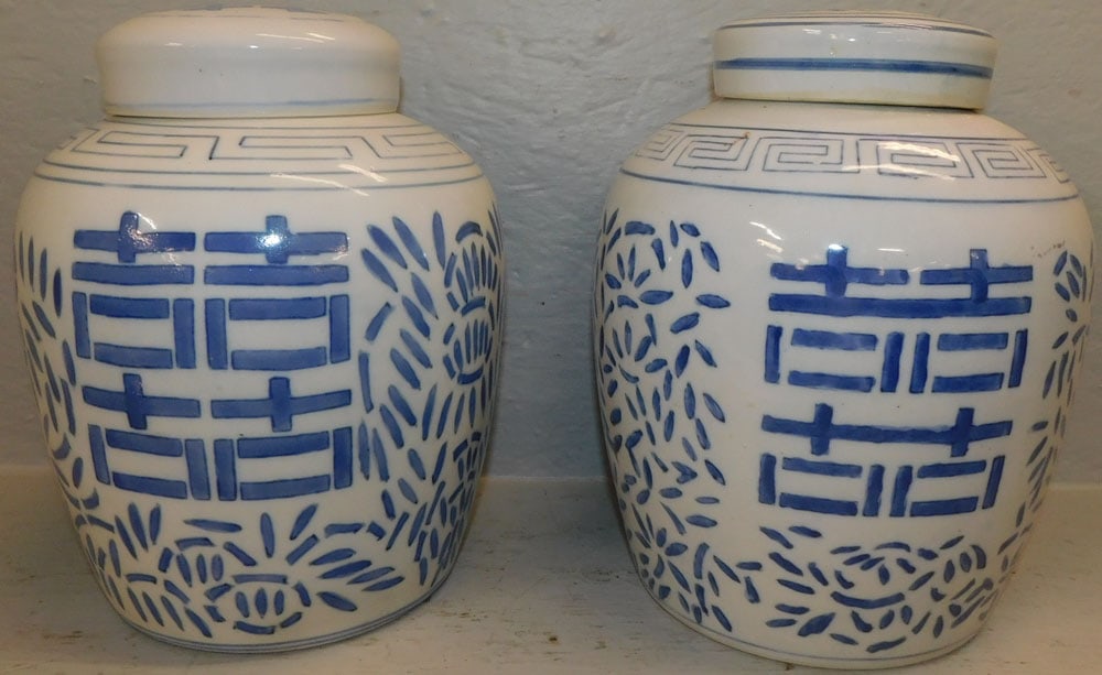 pair oriental blue and white ginger jars: pair oriental blue and white ginger jars. 10" H ALL DESCRIPTIONS AND ANY CONDITION STATEMENT GIVEN BY LANGSTON AUCTION GALLERY ARE STRICTLY OPINIONS AND LANGSTON'S SHALL HAVE NO RESPONSIBILITY FOR ERR