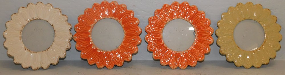 four painted porcelain photo frames: four painted porcelain photo frames. 8 1/4" Dia. ALL DESCRIPTIONS AND ANY CONDITION STATEMENT GIVEN BY LANGSTON AUCTION GALLERY ARE STRICTLY OPINIONS AND LANGSTON'S SHALL HAVE NO RESPONSIBILITY FOR ER