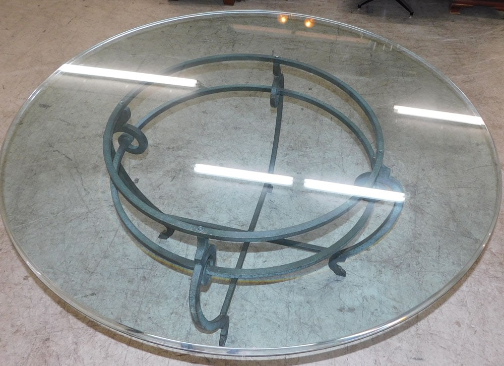 heavy round glass top table with wrought iron base (1 of 3)