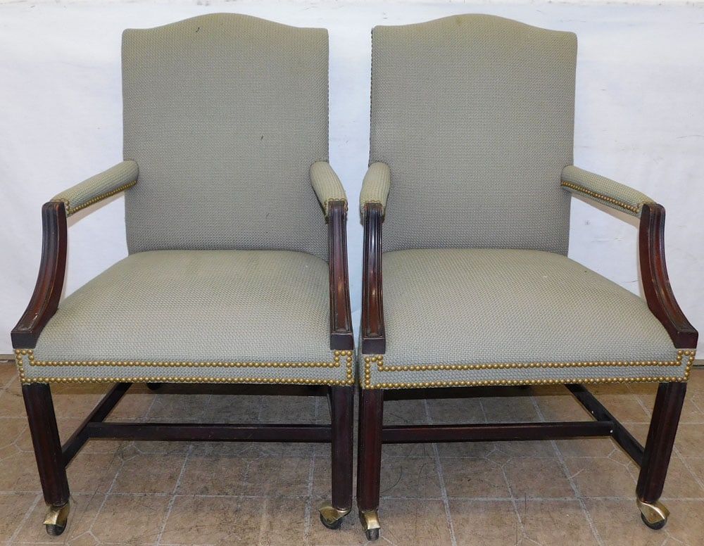 pair of mahogany and upholstery arm chairs: pair of mahogany and upholstery arm chairs. 39 3/4" H ALL DESCRIPTIONS AND ANY CONDITION STATEMENT GIVEN BY LANGSTON AUCTION GALLERY ARE STRICTLY OPINIONS AND LANGSTON'S SHALL HAVE NO RESPONSIBILITY F