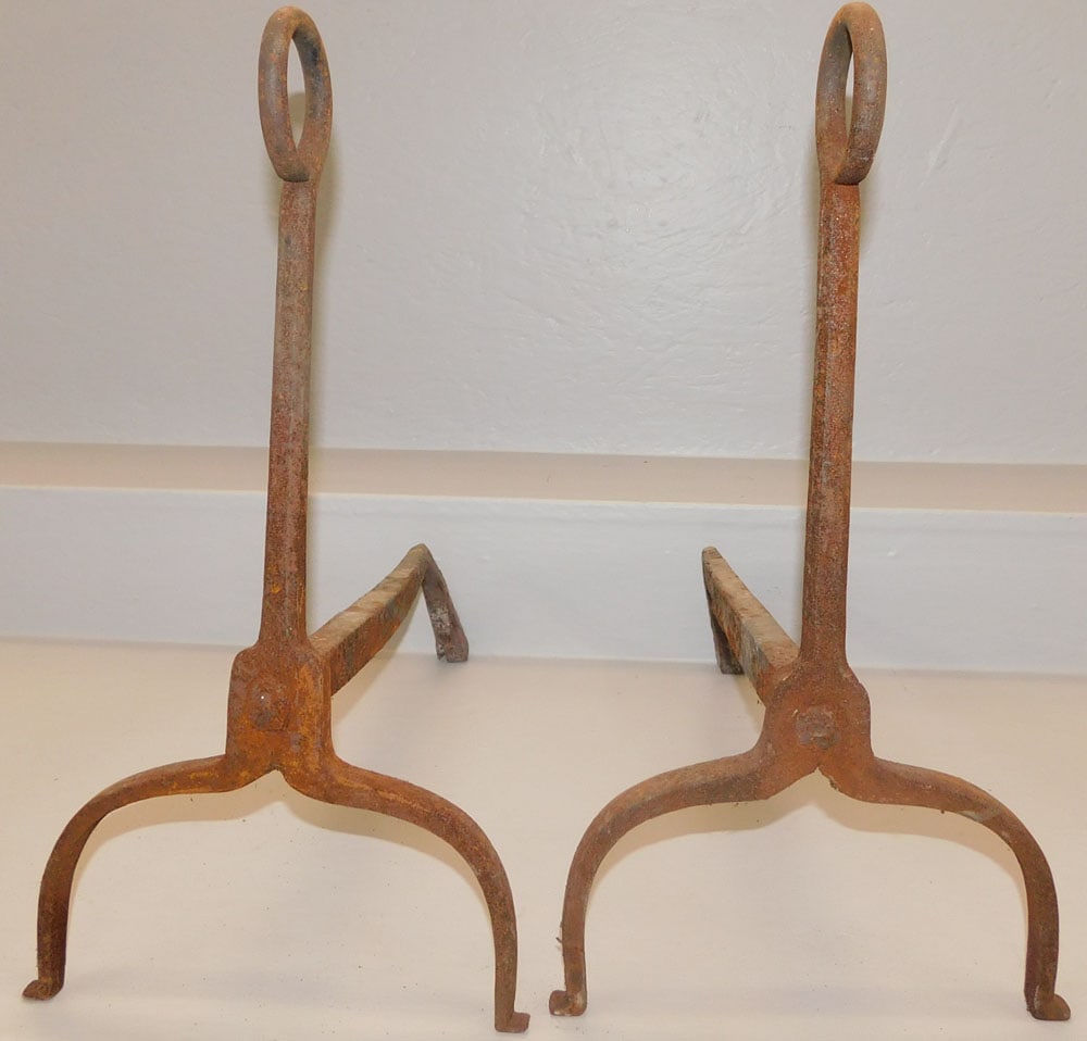 pair of antique wrought iron andirons: pair of antique wrought iron andirons. 20 1/4" H ALL DESCRIPTIONS AND ANY CONDITION STATEMENT GIVEN BY LANGSTON AUCTION GALLERY ARE STRICTLY OPINIONS AND LANGSTON'S SHALL HAVE NO RESPONSIBILITY FOR ER