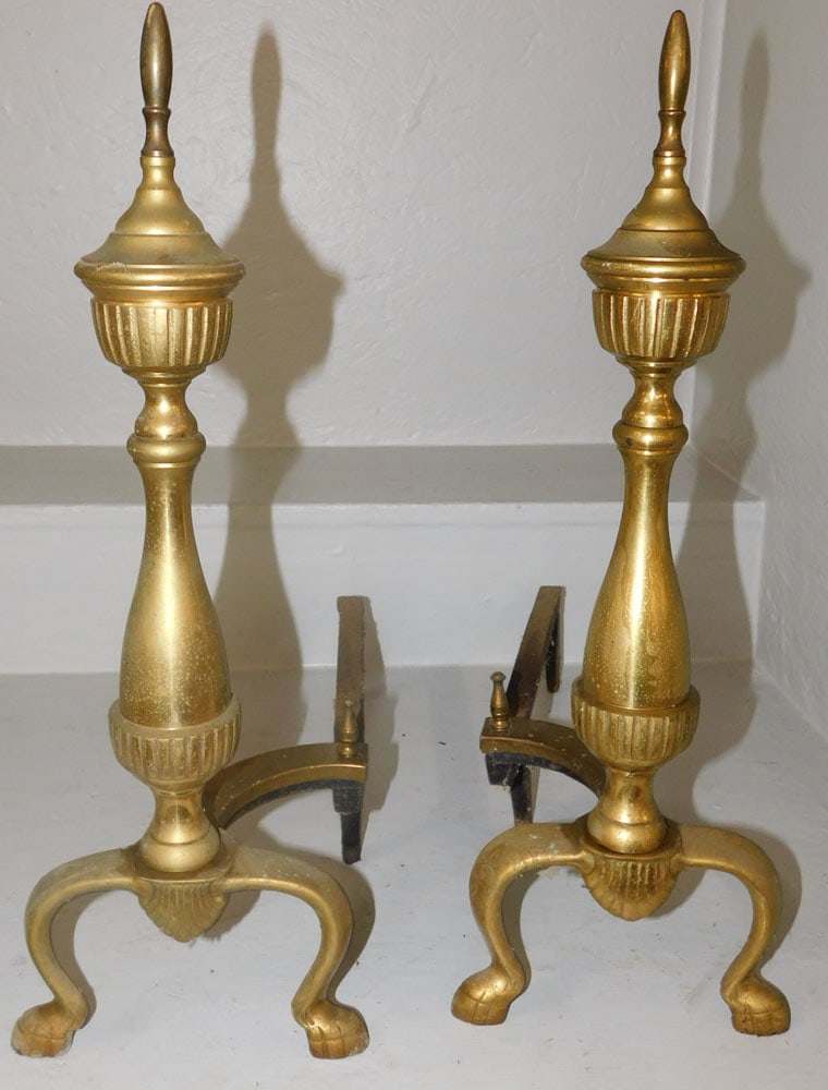pair of brass andirons: pair of brass andirons . 19 1/2" H ALL DESCRIPTIONS AND ANY CONDITION STATEMENT GIVEN BY LANGSTON AUCTION GALLERY ARE STRICTLY OPINIONS AND LANGSTON'S SHALL HAVE NO RESPONSIBILITY FOR ERRORS OR OMISSI