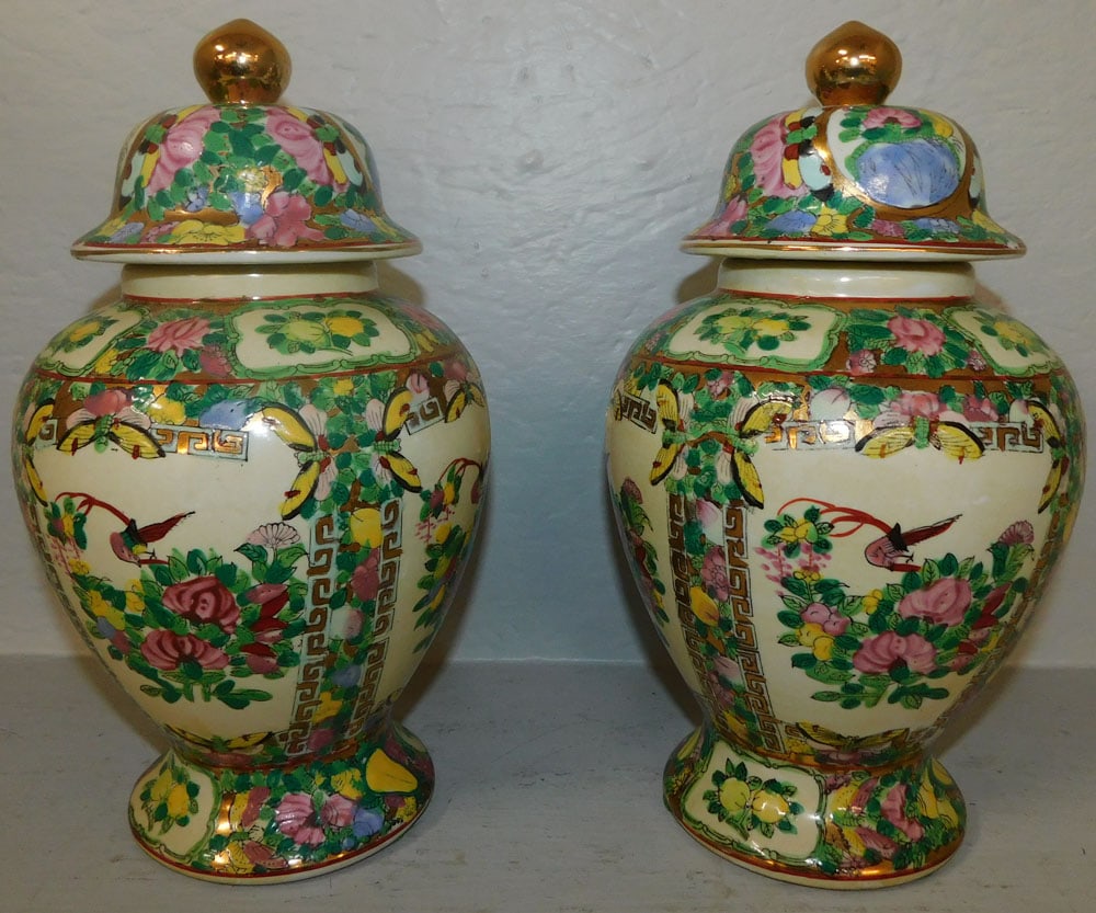 pair of oriental porcelain urns: pair of oriental porcelain urns. 11 1/2" H ALL DESCRIPTIONS AND ANY CONDITION STATEMENT GIVEN BY LANGSTON AUCTION GALLERY ARE STRICTLY OPINIONS AND LANGSTON'S SHALL HAVE NO RESPONSIBILITY FOR ERRORS O