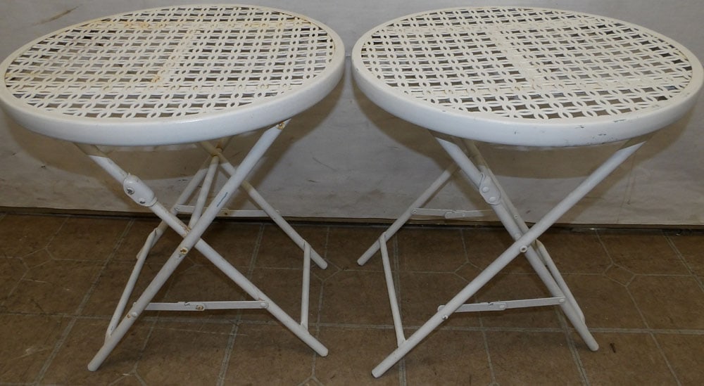 pair of painted metal round stands: pair of painted metal round stands. 18 Dia. 20" H ALL DESCRIPTIONS AND ANY CONDITION STATEMENT GIVEN BY LANGSTON AUCTION GALLERY ARE STRICTLY OPINIONS AND LANGSTON'S SHALL HAVE NO RESPONSIBILITY FOR E