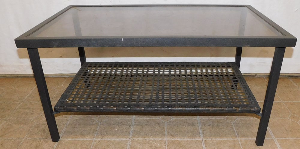 metal and glass top coffee table: metal and glass top coffee table. 36 22 1/4 17 3/4 ALL DESCRIPTIONS AND ANY CONDITION STATEMENT GIVEN BY LANGSTON AUCTION GALLERY ARE STRICTLY OPINIONS AND LANGSTON'S SHALL HAVE NO RESPONSIBILITY FOR 