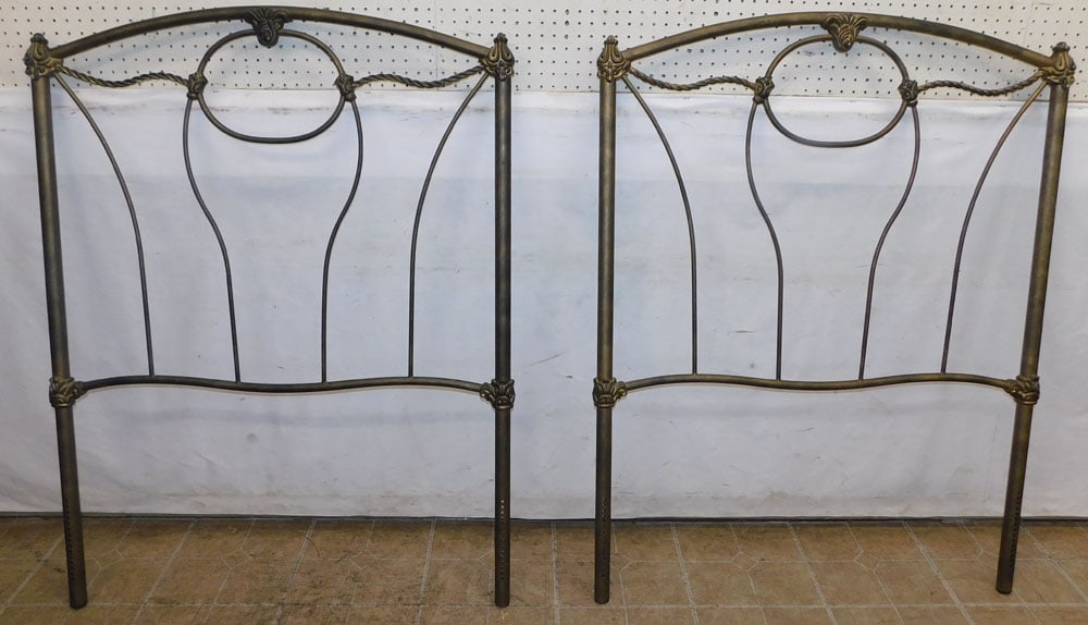 pair of metal twin headboards: pair of metal twin headboards. 39" x 50 1/2" ALL DESCRIPTIONS AND ANY CONDITION STATEMENT GIVEN BY LANGSTON AUCTION GALLERY ARE STRICTLY OPINIONS AND LANGSTON'S SHALL HAVE NO RESPONSIBILITY FOR ERRORS