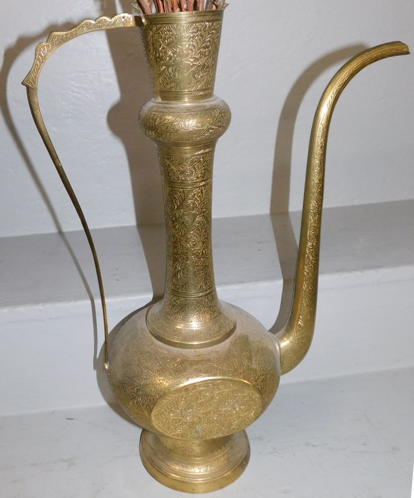 brass ewer: brass ewer. 18 1/4" H ALL DESCRIPTIONS AND ANY CONDITION STATEMENT GIVEN BY LANGSTON AUCTION GALLERY ARE STRICTLY OPINIONS AND LANGSTON'S SHALL HAVE NO RESPONSIBILITY FOR ERRORS OR OMISSIONS. THE ABSE