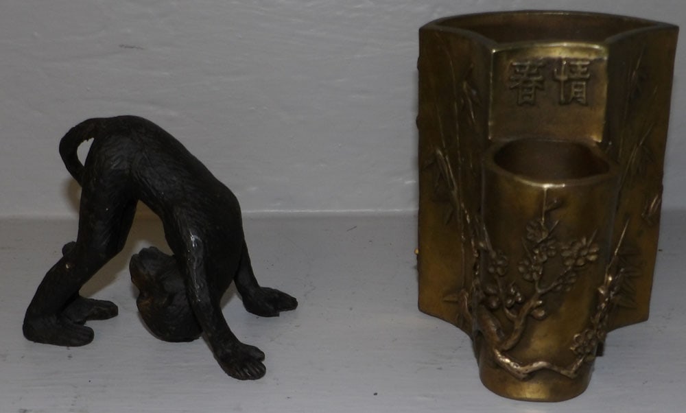 Chinese bronze vase with character marks and monkey: Chinese bronze vase with character marks and monkey. Up to 4 1/2" H ALL DESCRIPTIONS AND ANY CONDITION STATEMENT GIVEN BY LANGSTON AUCTION GALLERY ARE STRICTLY OPINIONS AND LANGSTON'S SHALL HAVE NO RE