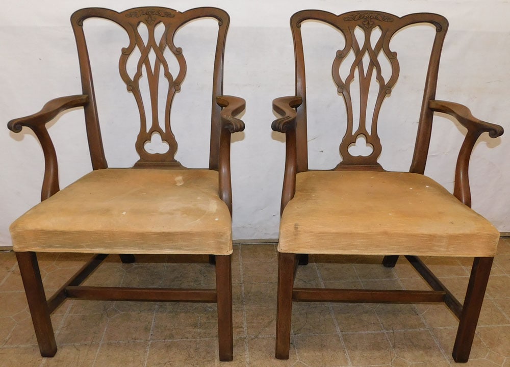 pair of mahogany arm chairs: pair of mahogany arm chairs. 38" H ALL DESCRIPTIONS AND ANY CONDITION STATEMENT GIVEN BY LANGSTON AUCTION GALLERY ARE STRICTLY OPINIONS AND LANGSTON'S SHALL HAVE NO RESPONSIBILITY FOR ERRORS OR OMISSI