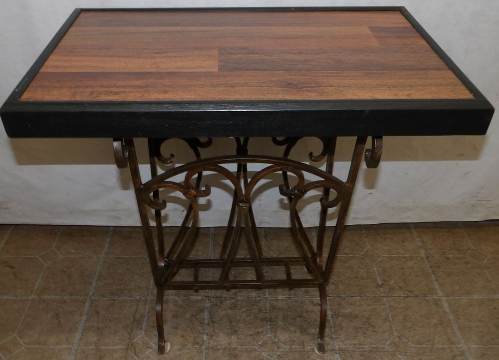 metal base table: metal base table. 26 1/4" W 16 1/2" D 26 1/4" H ALL DESCRIPTIONS AND ANY CONDITION STATEMENT GIVEN BY LANGSTON AUCTION GALLERY ARE STRICTLY OPINIONS AND LANGSTON'S SHALL HAVE NO RESPONSIBILITY FOR ERR