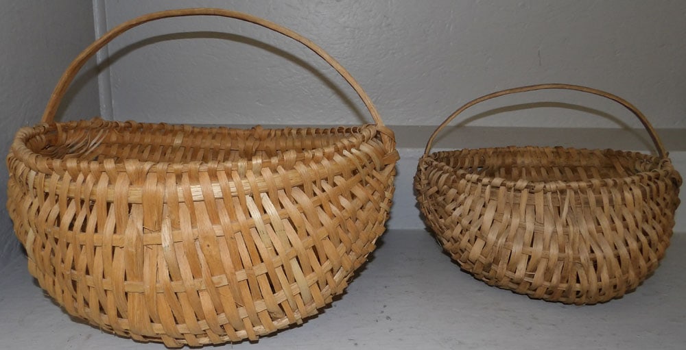 2 gizzard baskets: 2 gizzard baskets. 20" Dia. 15" H ALL DESCRIPTIONS AND ANY CONDITION STATEMENT GIVEN BY LANGSTON AUCTION GALLERY ARE STRICTLY OPINIONS AND LANGSTON'S SHALL HAVE NO RESPONSIBILITY FOR ERRORS OR OMISSIO