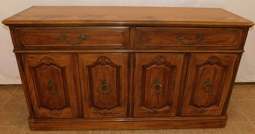 walnut French provincial sideboard: walnut French provincial sideboard. 62" W 20" D 33 3/4" H ALL DESCRIPTIONS AND ANY CONDITION STATEMENT GIVEN BY LANGSTON AUCTION GALLERY ARE STRICTLY OPINIONS AND LANGSTON'S SHALL HAVE NO RESPONSIBILI