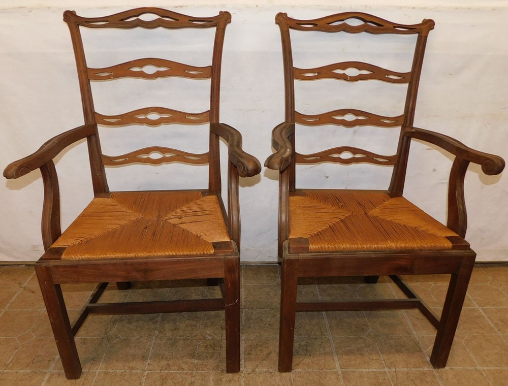 pair of mahogany arm chairs: pair of mahogany arm chairs. 41" H ALL DESCRIPTIONS AND ANY CONDITION STATEMENT GIVEN BY LANGSTON AUCTION GALLERY ARE STRICTLY OPINIONS AND LANGSTON'S SHALL HAVE NO RESPONSIBILITY FOR ERRORS OR OMISSI