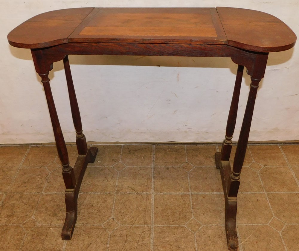 antique oak writing stand: antique oak writing stand. 30 1/2" W 13 1/2" D 27 1/2" H ALL DESCRIPTIONS AND ANY CONDITION STATEMENT GIVEN BY LANGSTON AUCTION GALLERY ARE STRICTLY OPINIONS AND LANGSTON'S SHALL HAVE NO RESPONSIBILIT