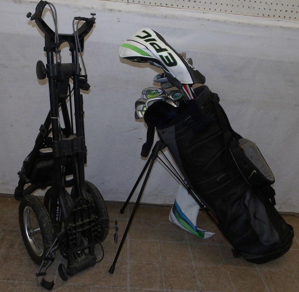 golf bag with clubs and kart: golf bag with clubs and kart. ALL DESCRIPTIONS AND ANY CONDITION STATEMENT GIVEN BY LANGSTON AUCTION GALLERY ARE STRICTLY OPINIONS AND LANGSTON'S SHALL HAVE NO RESPONSIBILITY FOR ERRORS OR OMISSIONS. 