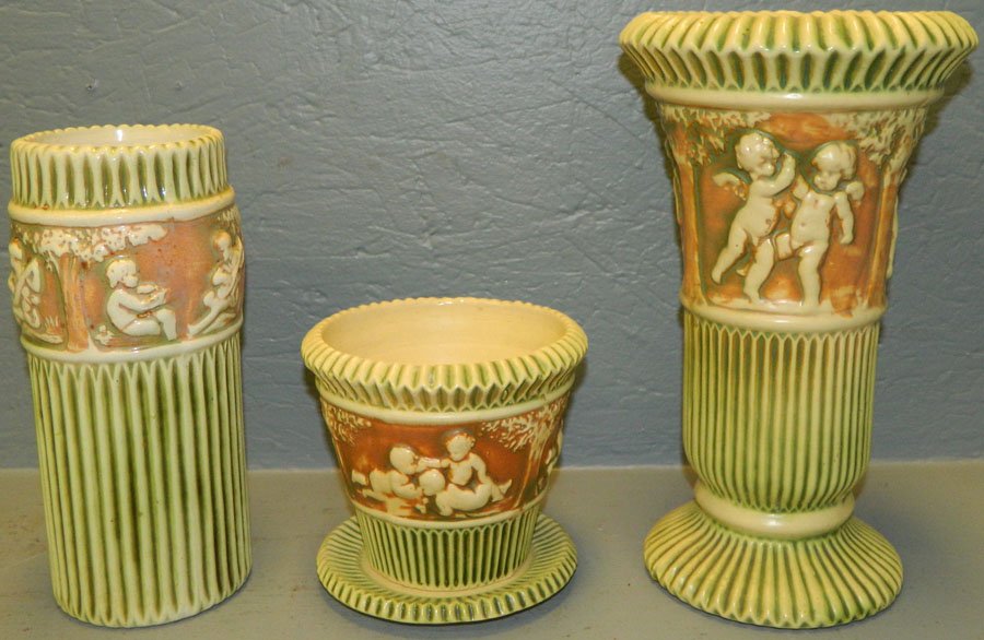 Roseville Donatello flower pot, saucer & (2)vases.: Roseville Donatello flower pot and saucer and (2) vases. 5 1/2" - 12".