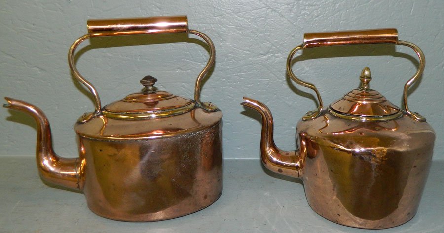 (2) 18th Century dovetail copper kettles.: (2) 18th Century dovetail copper kettles. 9" and 10".