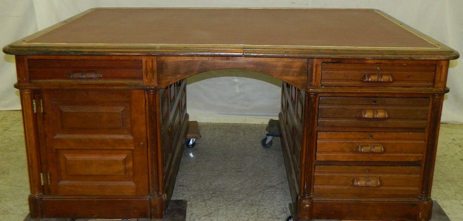 Leather top walnut partners' desk.: Leather top walnut partners' desk. 48" wide x 69 1/2".