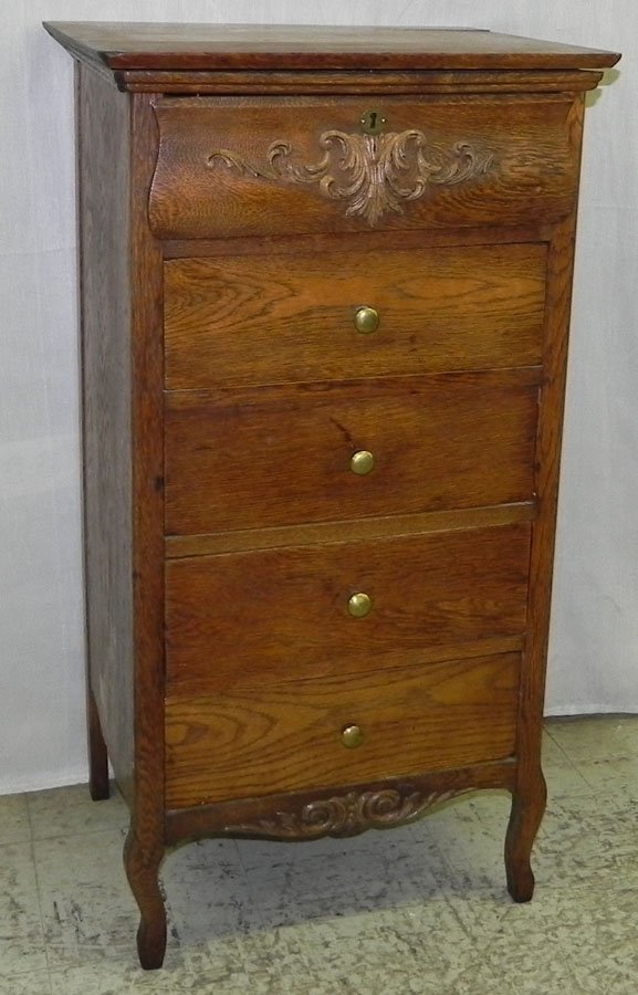 Oak music cabinet with 72 Edison wax records.: Oak music cabinet with 72 Edison wax records.