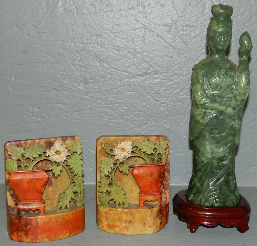 Soapstone figure and Soapstone bookends.: Soapstone figure 10 1/2" tall and a pair of Soapstone bookends 4 1/2" tall.