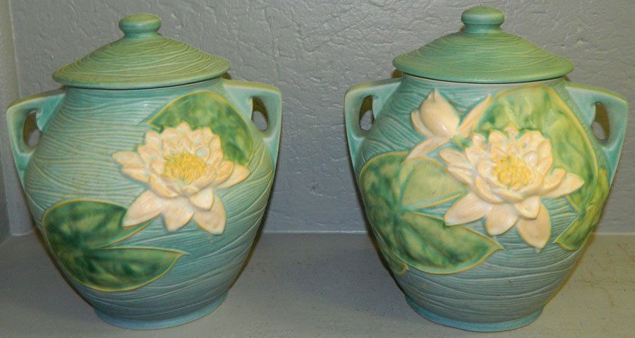 (2) Roseville Water Lily cookie jars.: (2) Roseville Water Lily cookie jars. 10 1/4" tall.