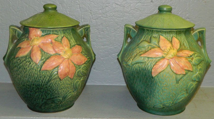 (2) Roseville Clematis cookie jars.: (2) Roseville Clematis cookie jars. 11" and 10 1/2" tall.
