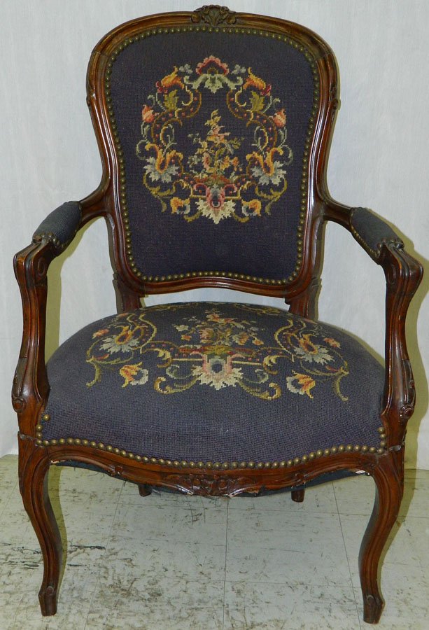 19th Century French needlepoint arm chair.: 19th Century French needlepoint arm chair.