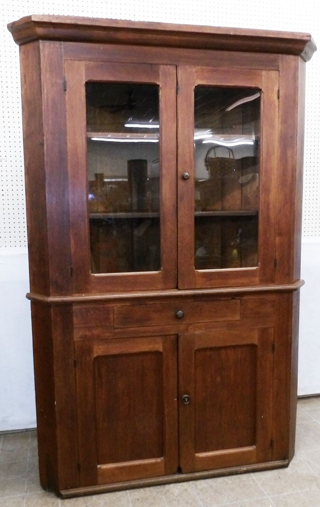 19th Century Walnut One Piece Glass Door Corner Cabinet: 19th Century Walnut One Piece Glass Door Corner Cabinet . 55" W 24" D 81" H "ALL DESCRIPTIONS AND ANY CONDITION STATEMENT GIVEN BY LANGSTON AUCTION GALLERY ARE STRICTLY OPINIONS AND LANGSTON'S SHALL H