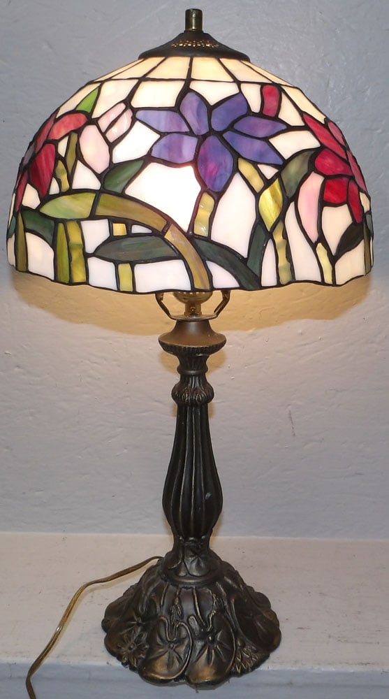 Leaded & Stained Glass Tiffany Style Lamp: Leaded & Stained Glass Tiffany Style Lamp. 21 1/2" H "ALL DESCRIPTIONS AND ANY CONDITION STATEMENT GIVEN BY LANGSTON AUCTION GALLERY ARE STRICTLY OPINIONS AND LANGSTON'S SHALL HAVE NO RESPONSIBILITY F