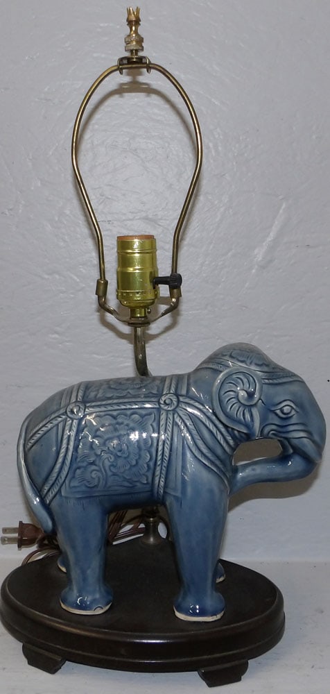 Oriental elephant porcelain lamp: Oriental elephant porcelain lamp. 20 1/4" H "ALL DESCRIPTIONS AND ANY CONDITION STATEMENT GIVEN BY LANGSTON AUCTION GALLERY ARE STRICTLY OPINIONS AND LANGSTON'S SHALL HAVE NO RESPONSIBILITY FOR ERRORS