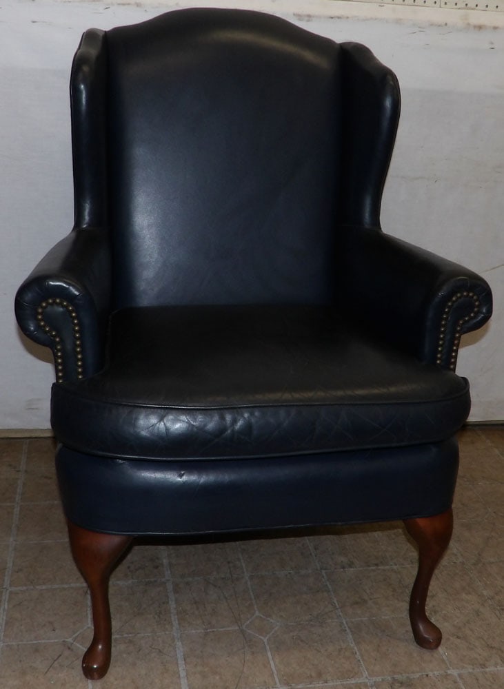 Blue leather upholstered wing back chair by Distinction Furniture Corp. (1 of 5)