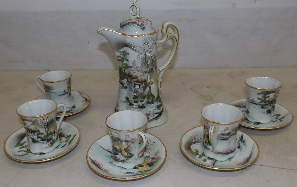 oriental porcelain chocolate set: oriental porcelain chocolate set . Up to 9 1/4" H "ALL DESCRIPTIONS AND ANY CONDITION STATEMENT GIVEN BY LANGSTON AUCTION GALLERY ARE STRICTLY OPINIONS AND LANGSTON'S SHALL HAVE NO RESPONSIBILITY FOR 