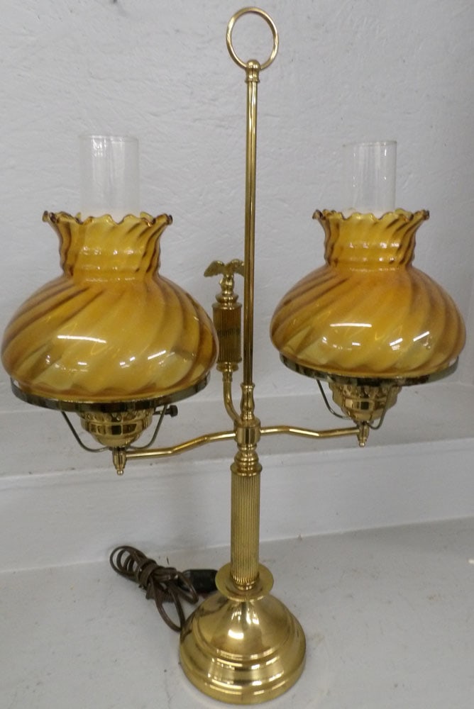 brass student lamp with amber glass shades: brass student lamp with amber glass shades . 27" H "ALL DESCRIPTIONS AND ANY CONDITION STATEMENT GIVEN BY LANGSTON AUCTION GALLERY ARE STRICTLY OPINIONS AND LANGSTON'S SHALL HAVE NO RESPONSIBILITY FOR