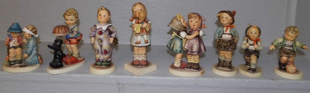 8 Hummel Figurines: 8 Hummel Figurines . Up to 6" H "ALL DESCRIPTIONS AND ANY CONDITION STATEMENT GIVEN BY LANGSTON AUCTION GALLERY ARE STRICTLY OPINIONS AND LANGSTON'S SHALL HAVE NO RESPONSIBILITY FOR ERRORS OR OMISSION